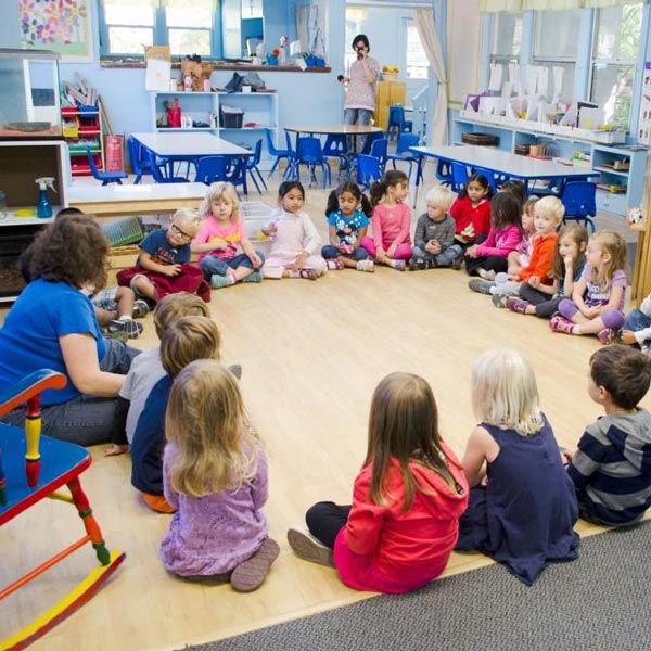 children in a circle during class